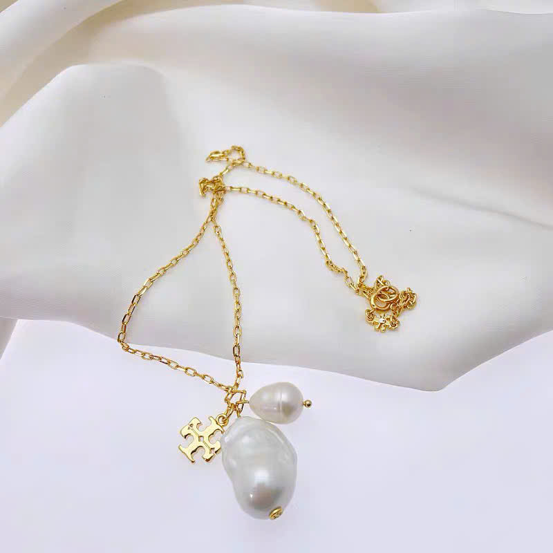 Dây chuyền Tory Burch ngọc trai kèm logo