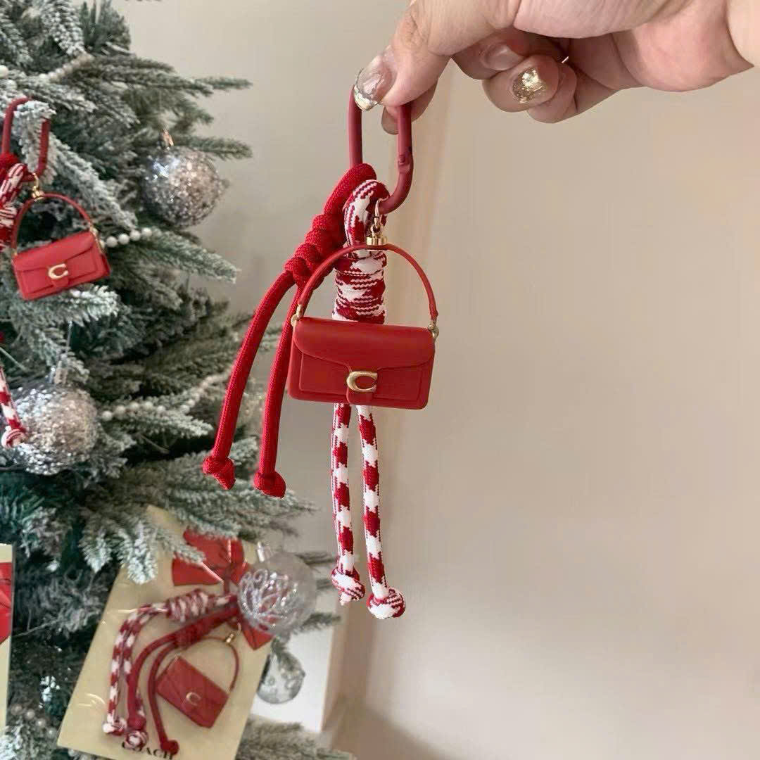 Charm COACH đỏ dư xịn fullbox