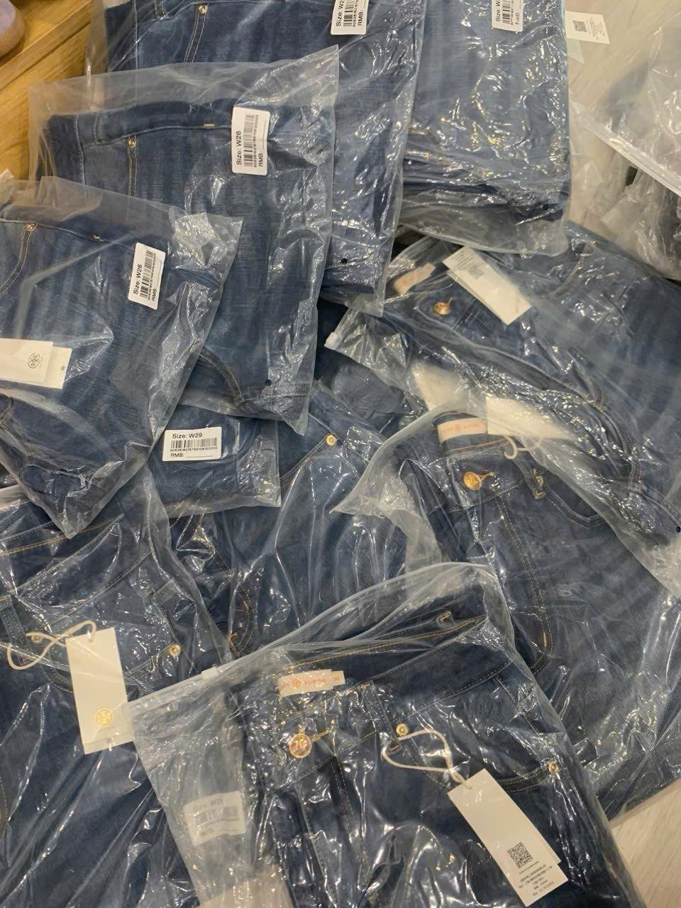 Quần denim Tory Burch dư xịn