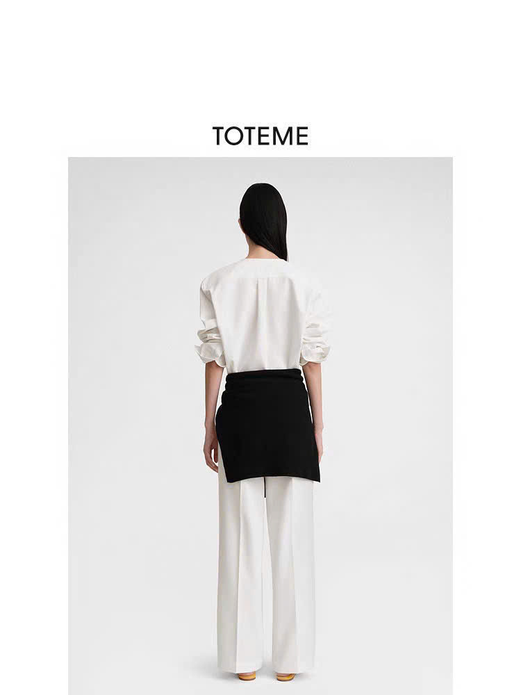 Sơ mi dáng loose cổ tròn khuy ngực