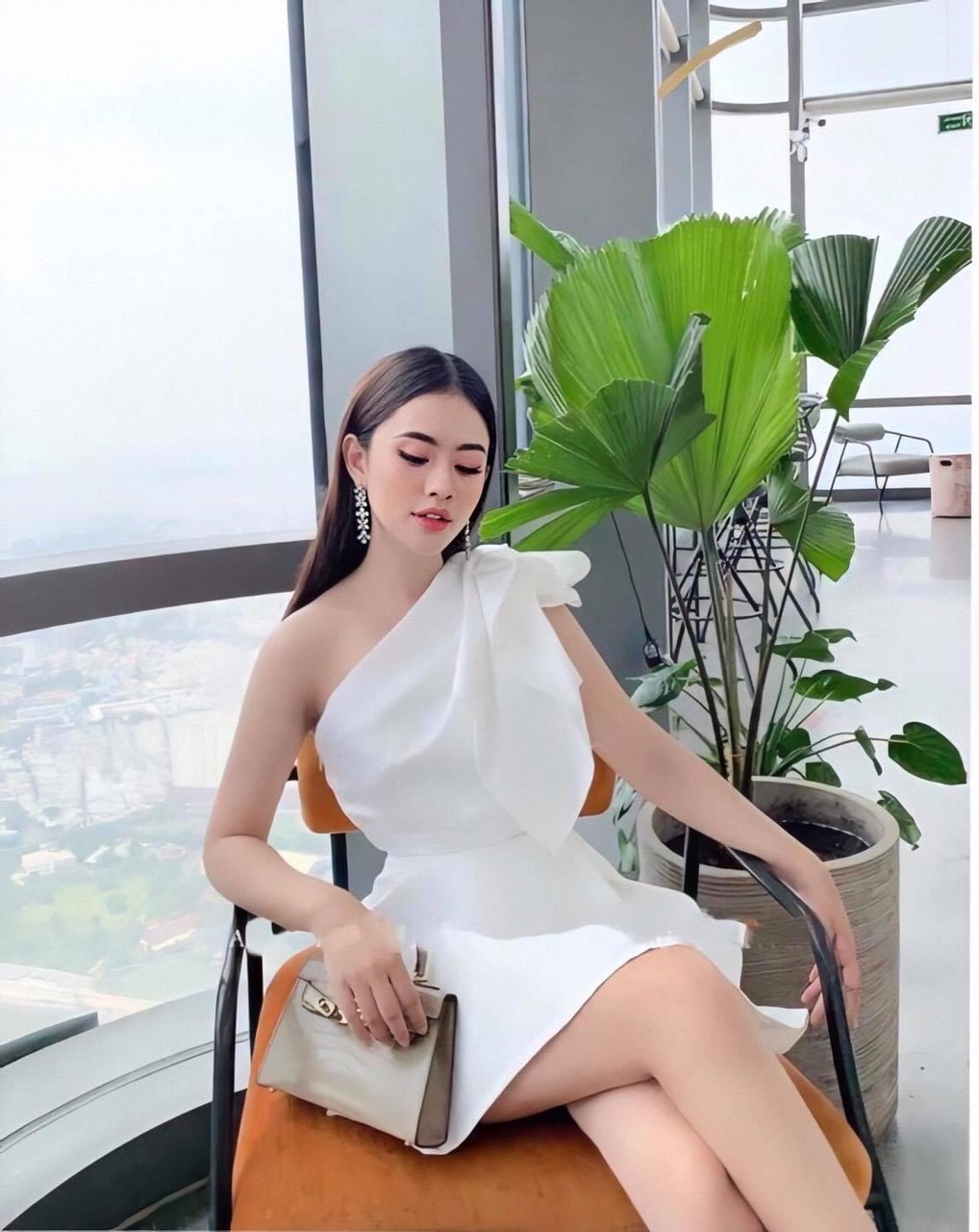 Đầm xoè kiểu lệch vai nơ đắp chéo tà (Hồng)