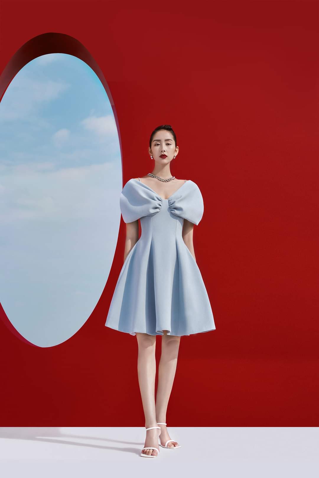 Đầm dáng xòe hai dây hở vai ngang phối nơ (Xanh)