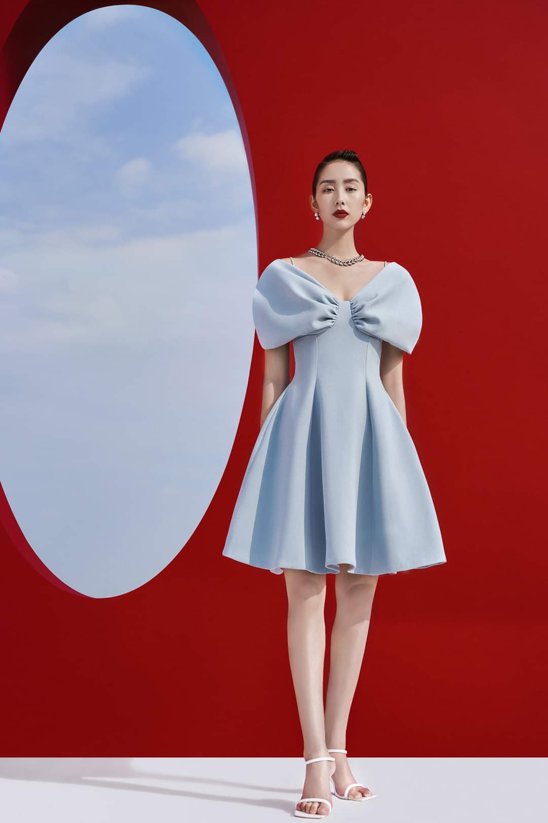 Đầm dáng xòe hai dây hở vai ngang phối nơ (Xanh)