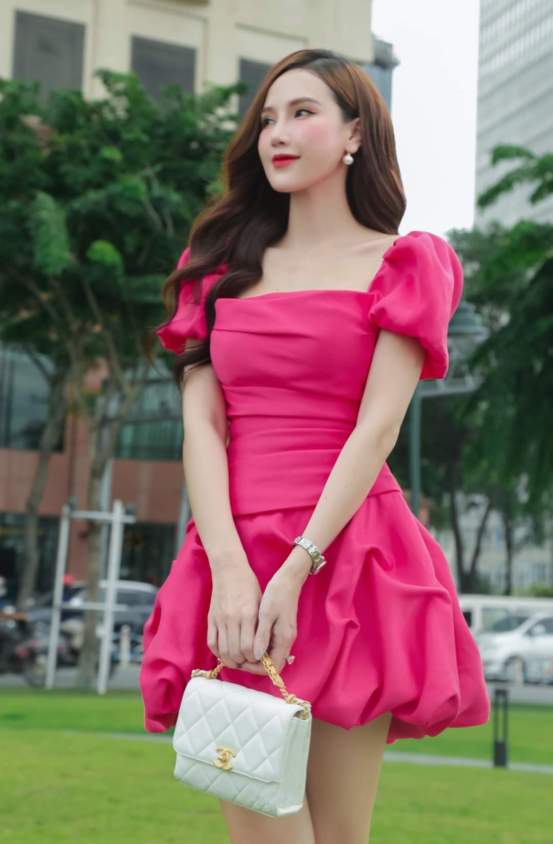 Đầm xòe bồng trên gối cúp ngực phối tay con (Vàng)