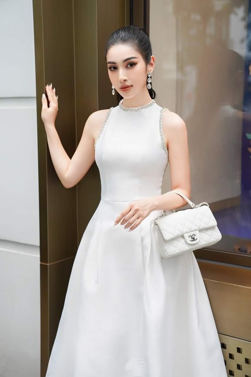 Đầm dự tiệc dáng xòe kiểu sát nách phối túi đính viền ngọc Alvin Store 1599 (Đen)