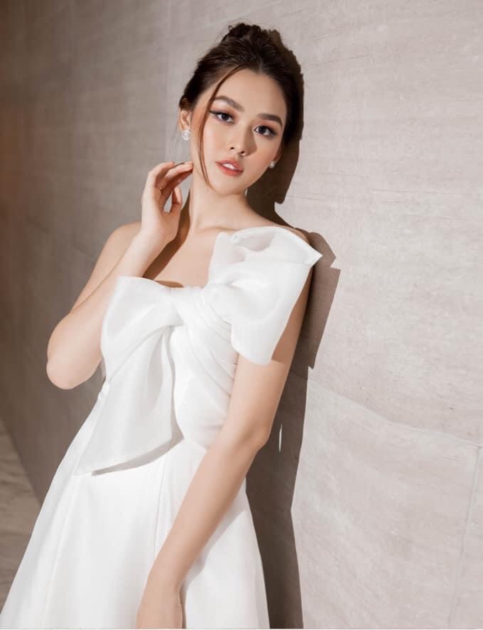 Đầm xòe kiểu cúp ngực phối nơ lệch vai