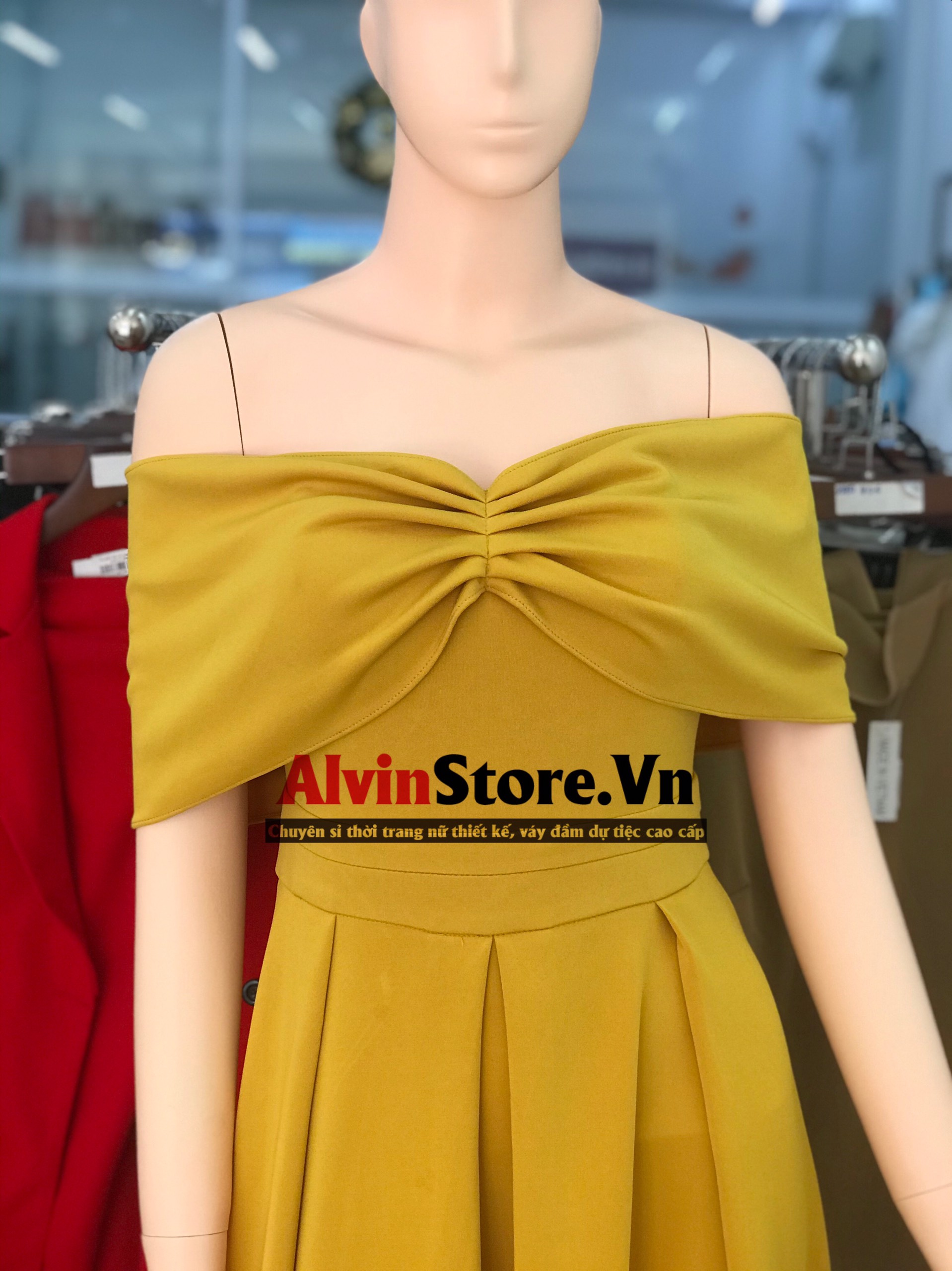 Đầm xoè dài hở vai ngang xếp ly ngực (Nude)