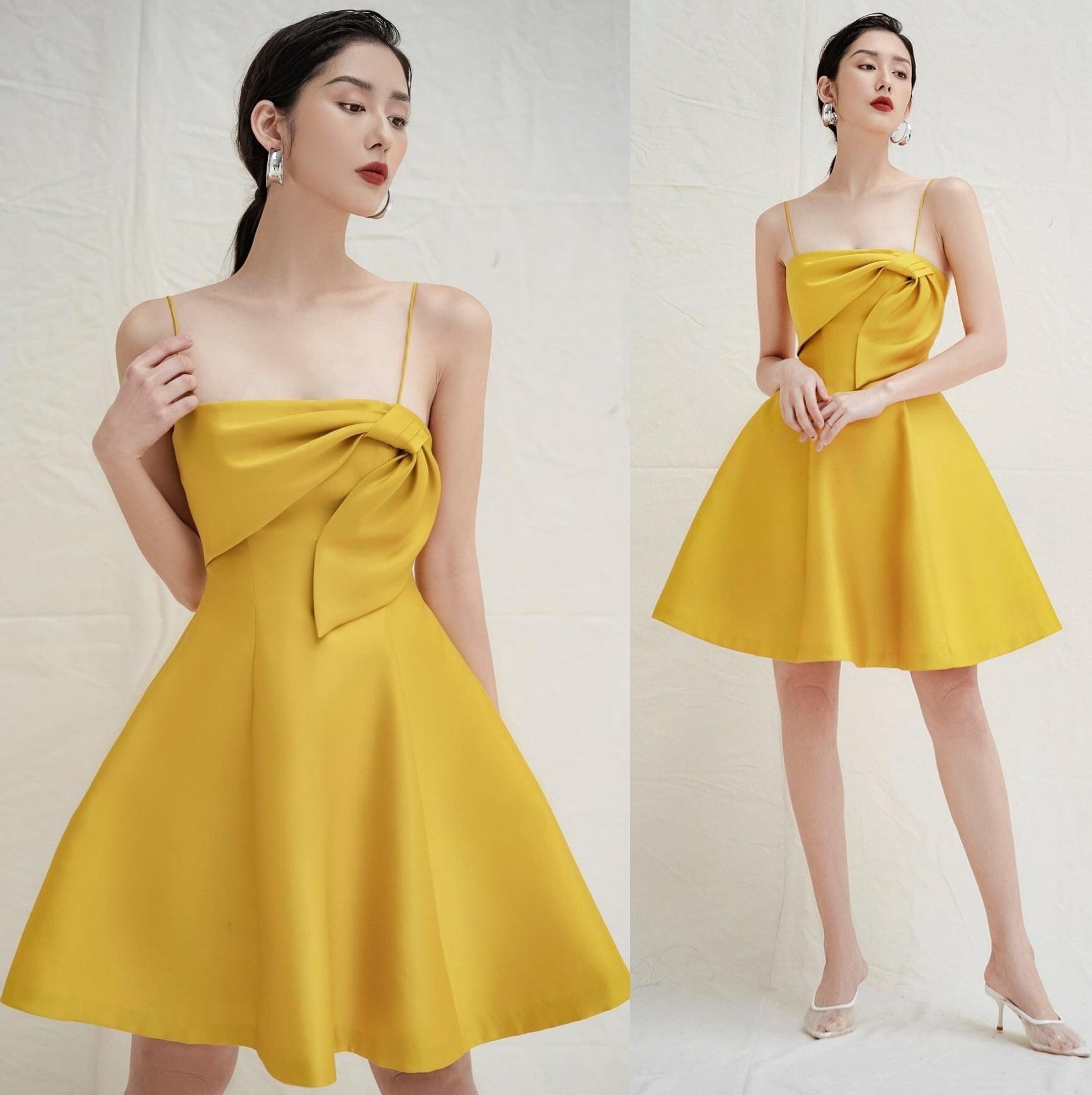 Đầm xoè hai dây cúp ngực phối nơ (Vàng)