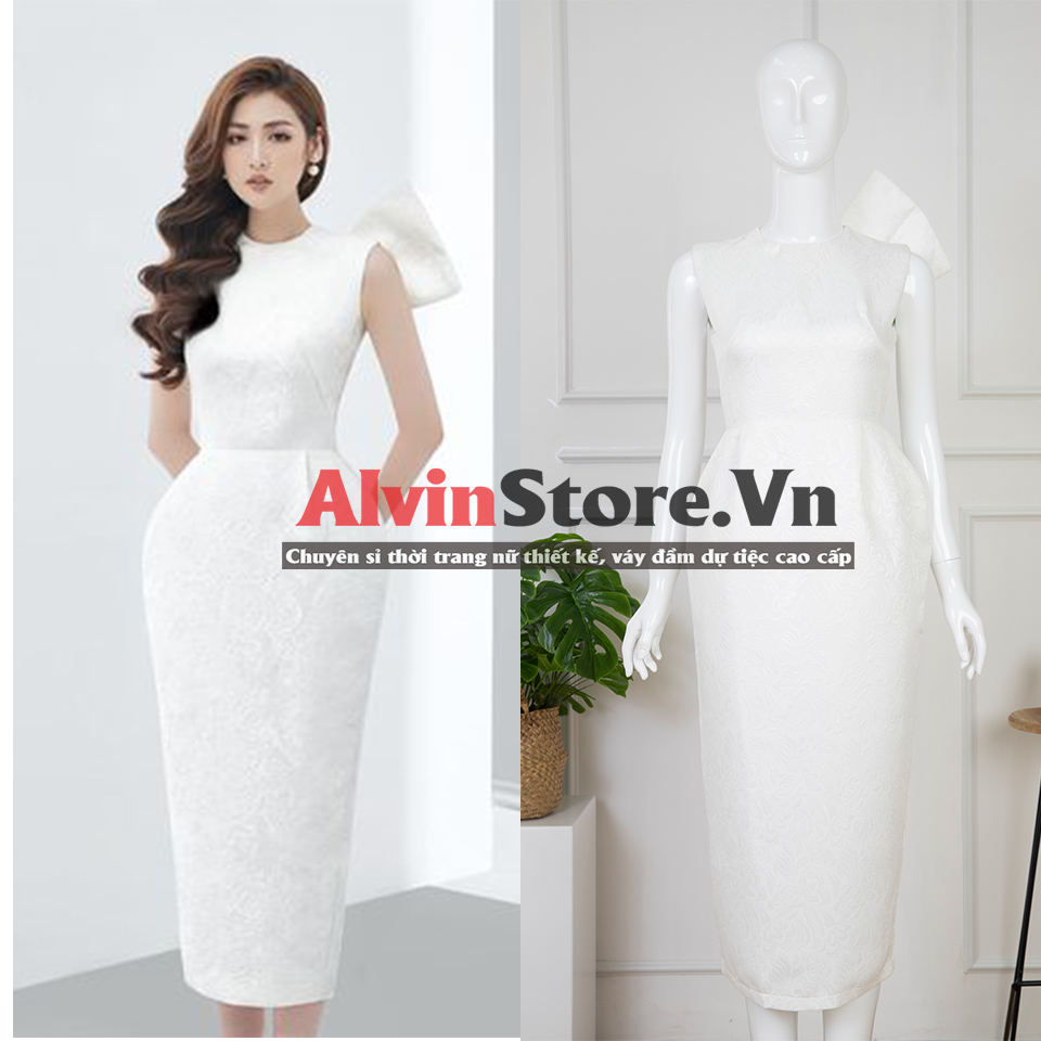 Đầm gấm ôm body sát nách nơ lưng đính ngọc