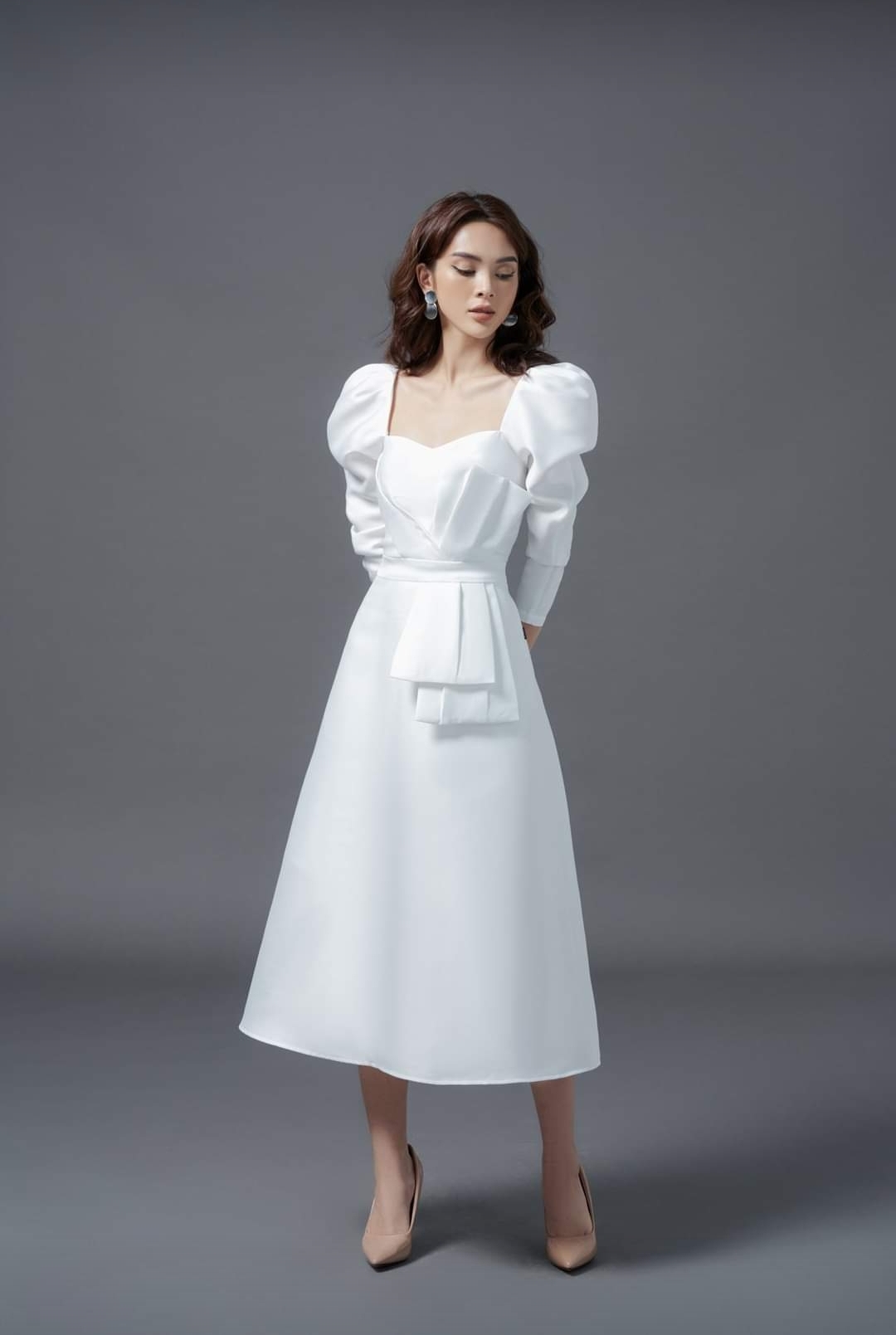 Đầm dáng xòe tay phồng dài cúp ngực phối nơ