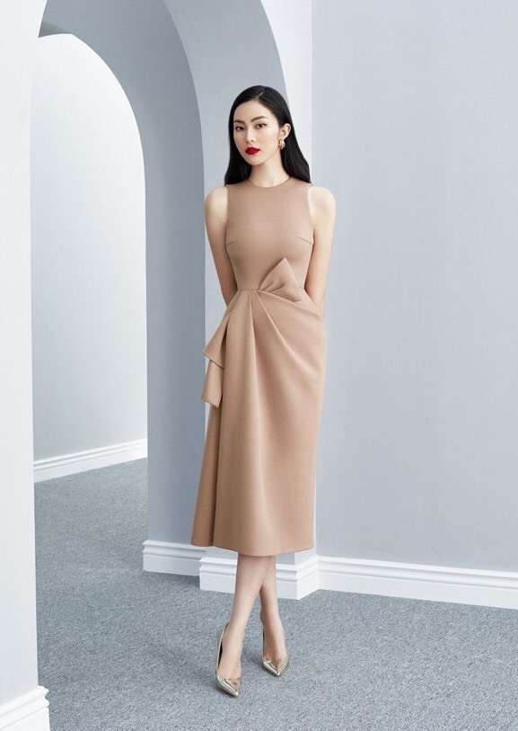 Đầm xòe kiểu sát nách xếp ly nơ eo (Trắng)