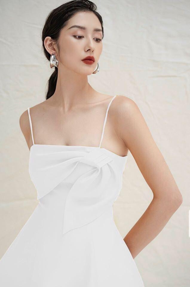 Đầm xoè hai dây cúp ngực phối nơ (Vàng)
