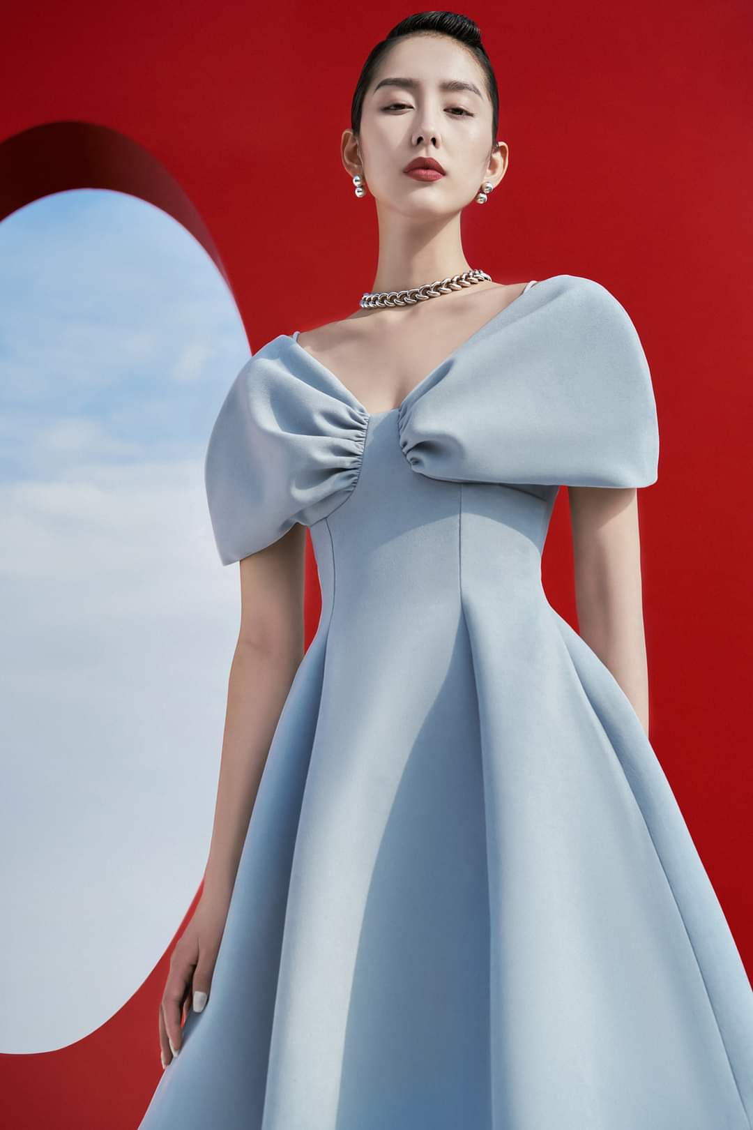 Đầm dáng xòe hai dây hở vai ngang phối nơ (Xanh)