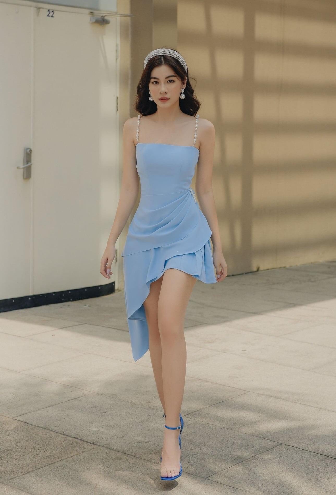 Đầm xòe kiểu hai dây cúp ngực xéo lai (Xanh)