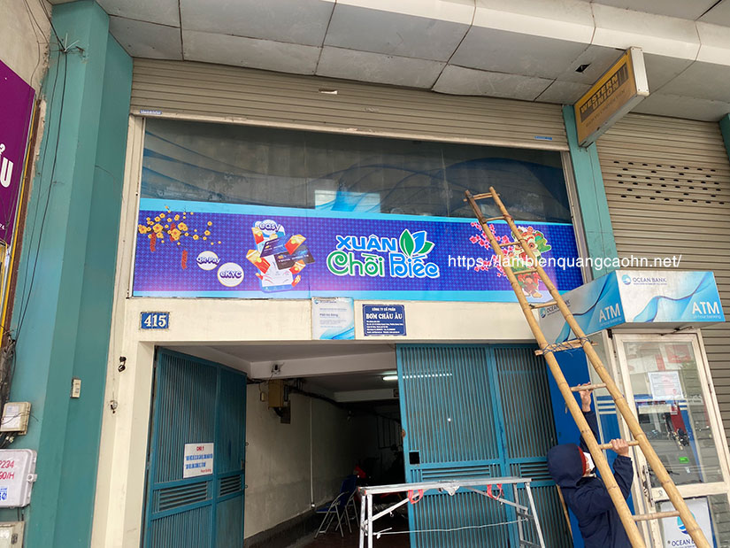 decal trang trí tết, dán decal kính, cổng chào tết, đề can dán kính, dán cửa kính