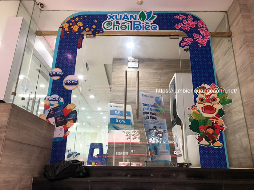 decal trang trí tết, dán decal kính, cổng chào tết, đề can dán kính, dán cửa kính