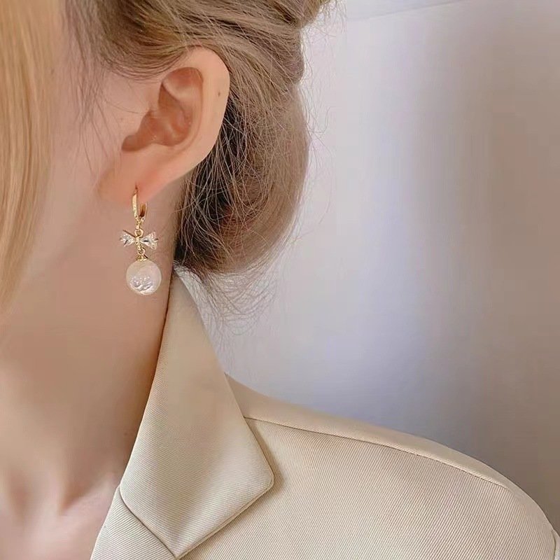 Bông tai ngọc trai  hình nơ đính đá pha lê H99