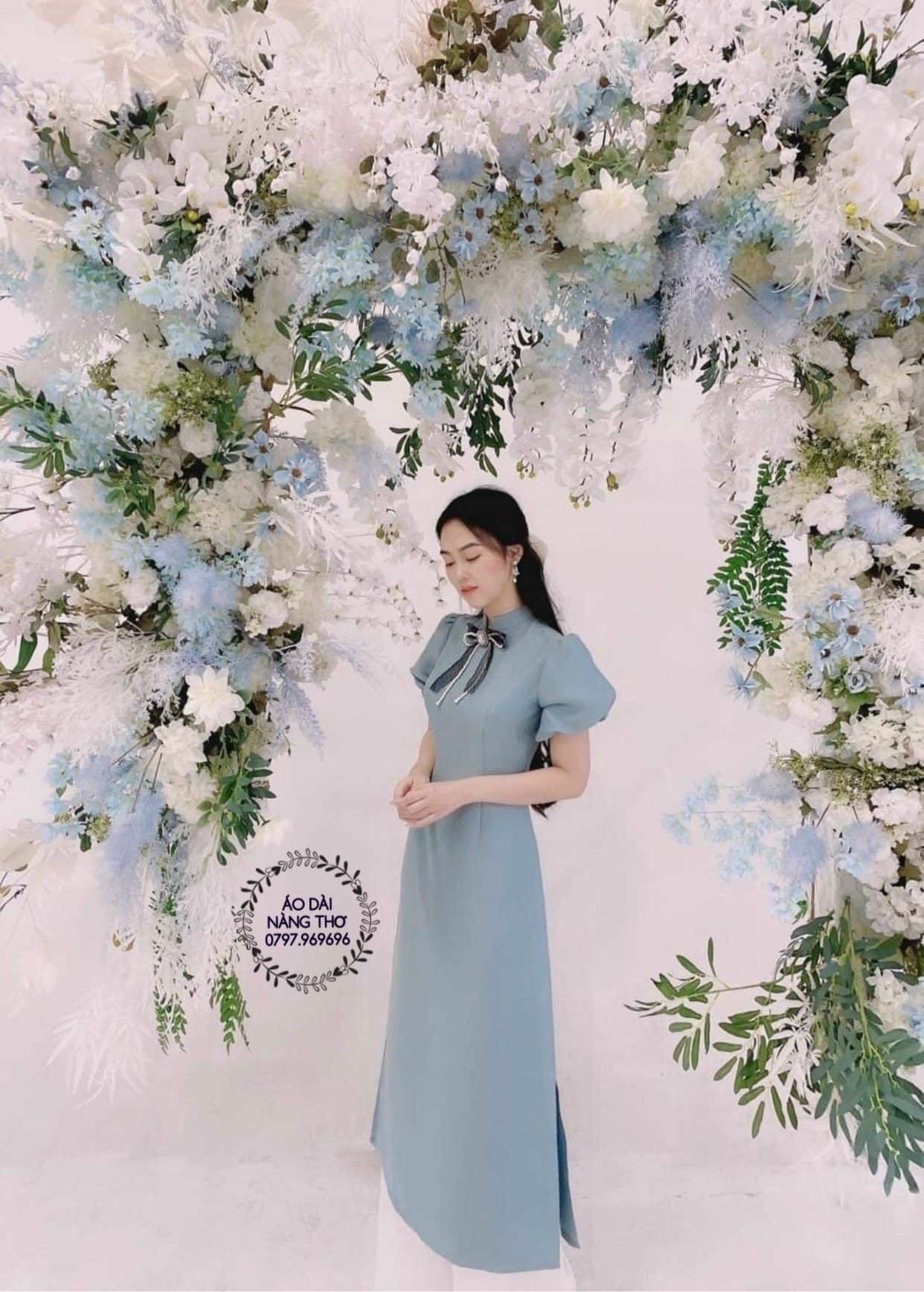 Áo Dài Cách Tân Lửng Xanh Tơ Kết Nơ