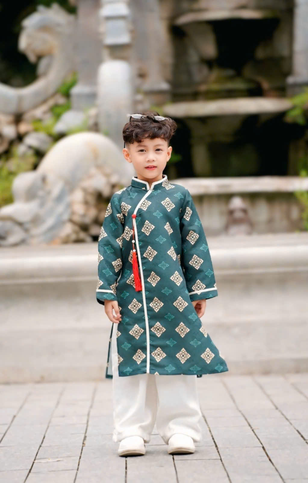 Áo Dài Bé Trai Gấm Xanh Họa Tiết Chìm