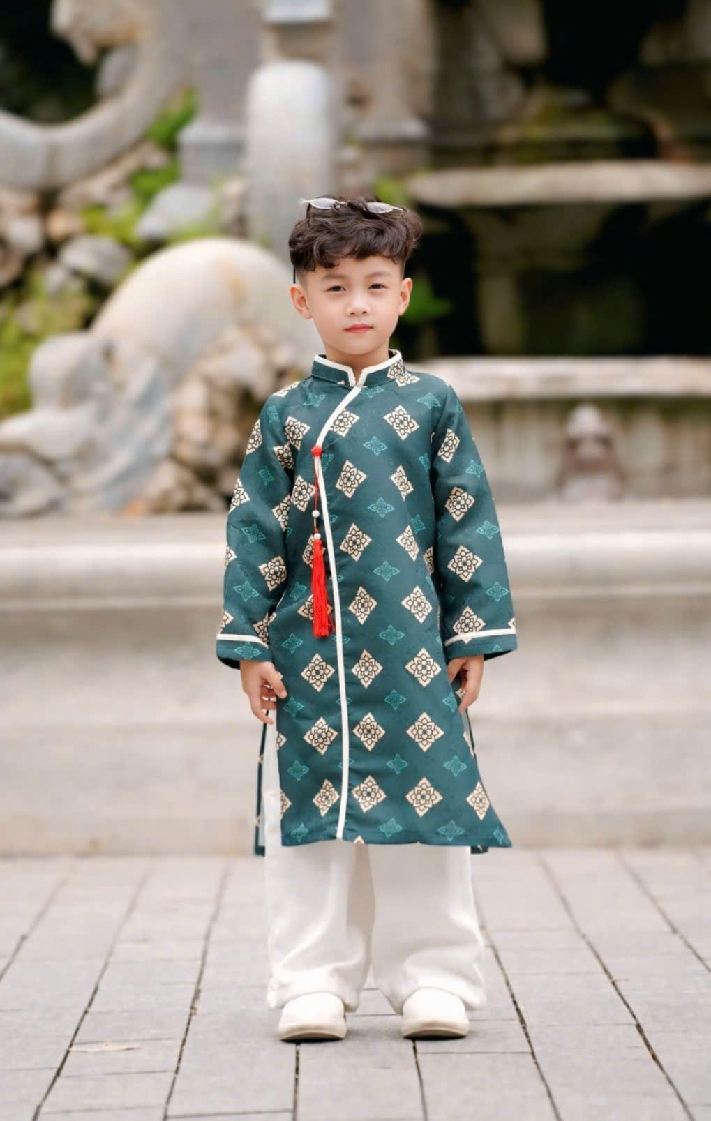 Áo Dài Bé Trai Gấm Xanh Họa Tiết Chìm