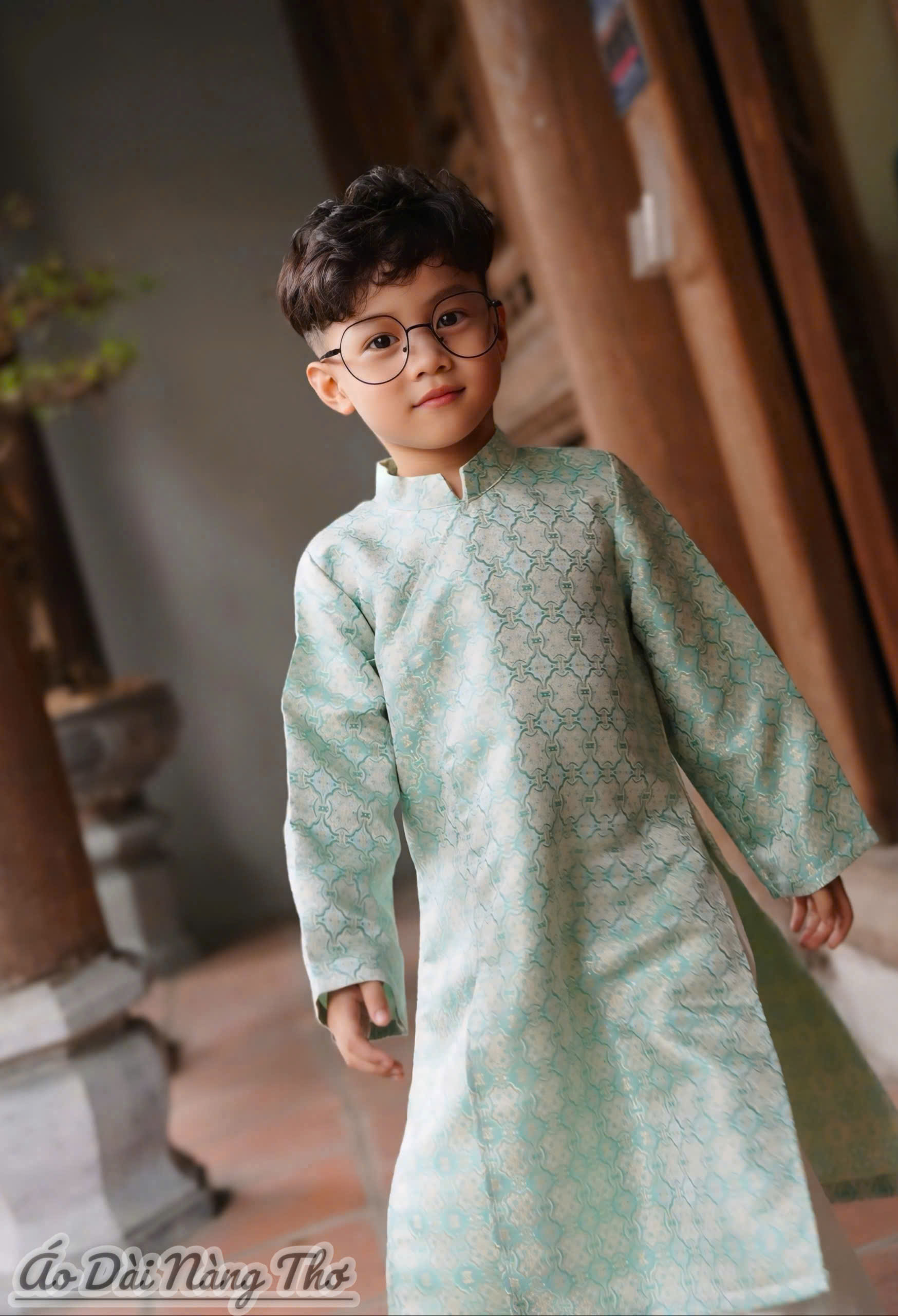 Áo Dài Bé Trai Gấm Xanh Họa Tiết Đồng Tiền