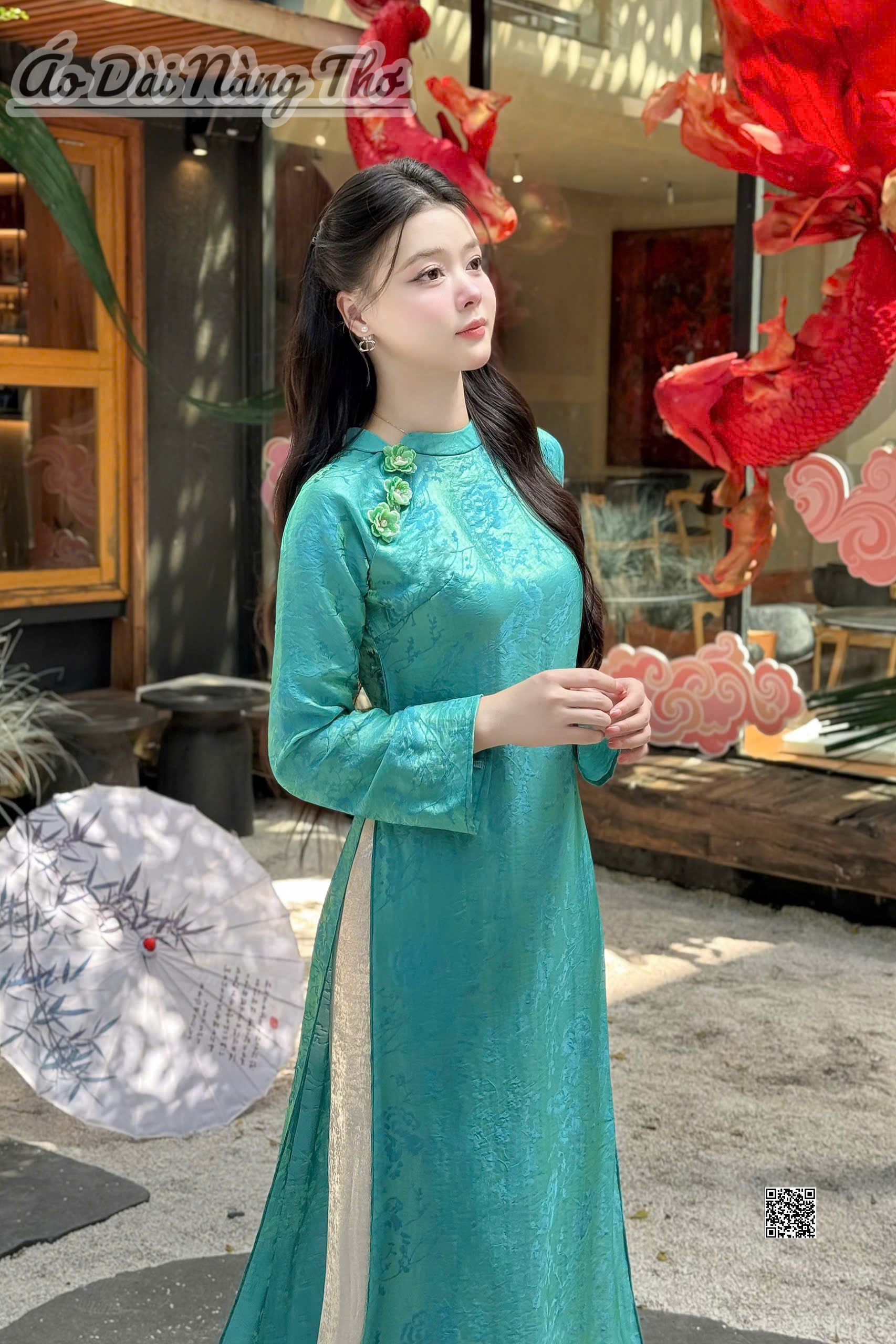 Áo Dài Cách Tân Lụa Xanh Đính Hoa Xinh Xắn