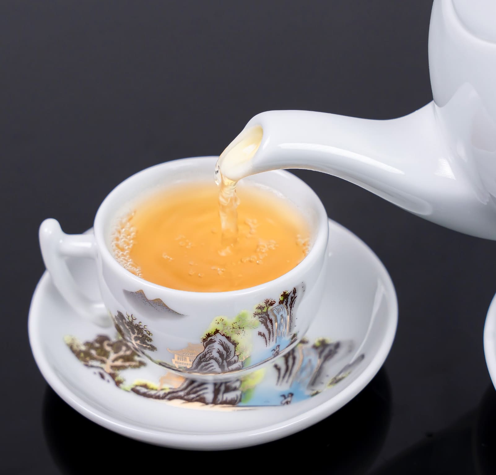 Bộ ấm trà cao cấp Bát Tràng họa tiết thủy mặc tinh tế sang trọng mã BT-006, dung tích 600ml