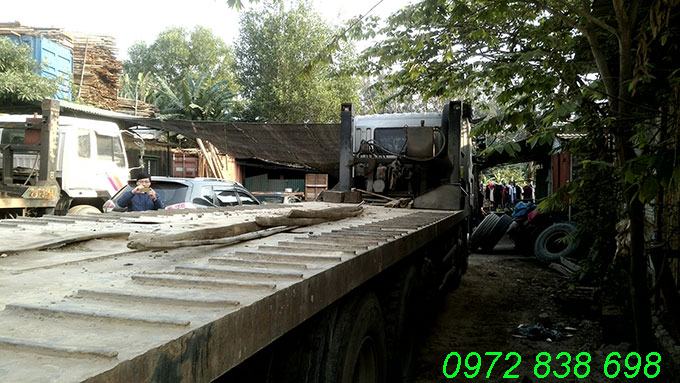 giá xe nâng đầu chở máy công trình cũ