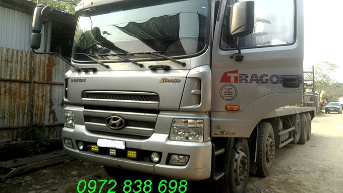 xe nâng đầu chở máy công trình cũ
