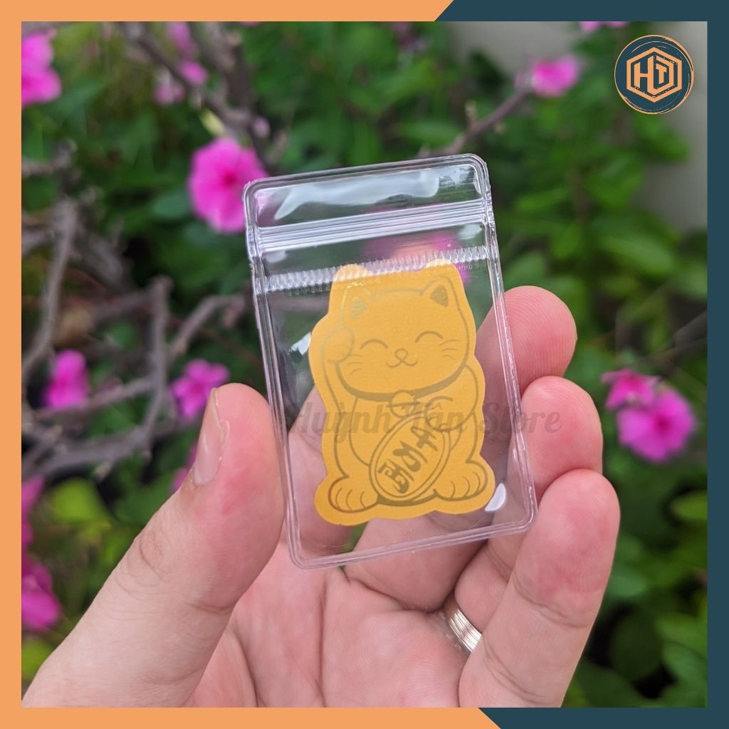 Miếng dán Mèo Thần Tài trang trí điện thoại.