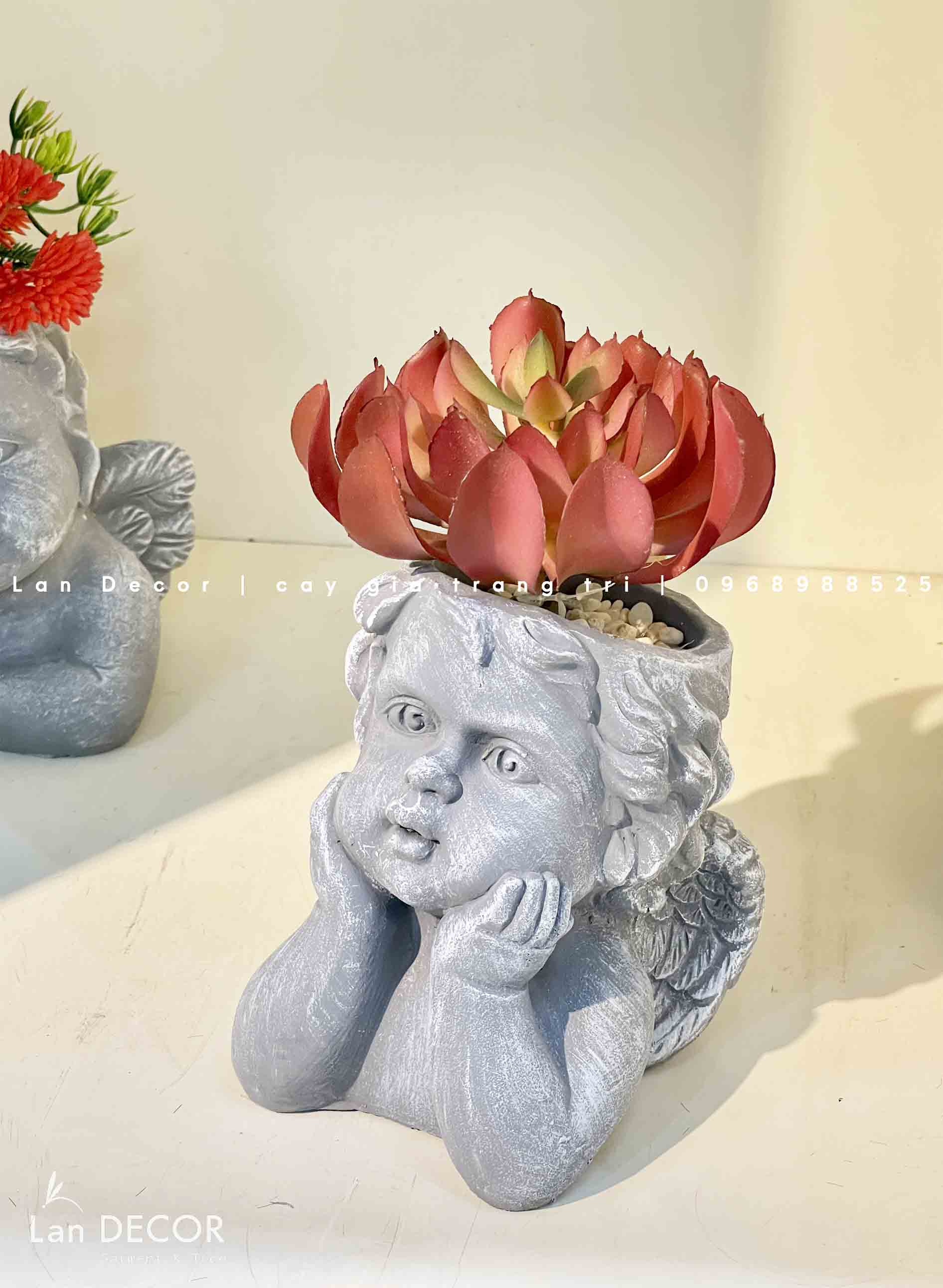 chậu-cây-tượng-gốm