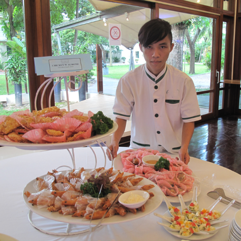 student preparing a catering event