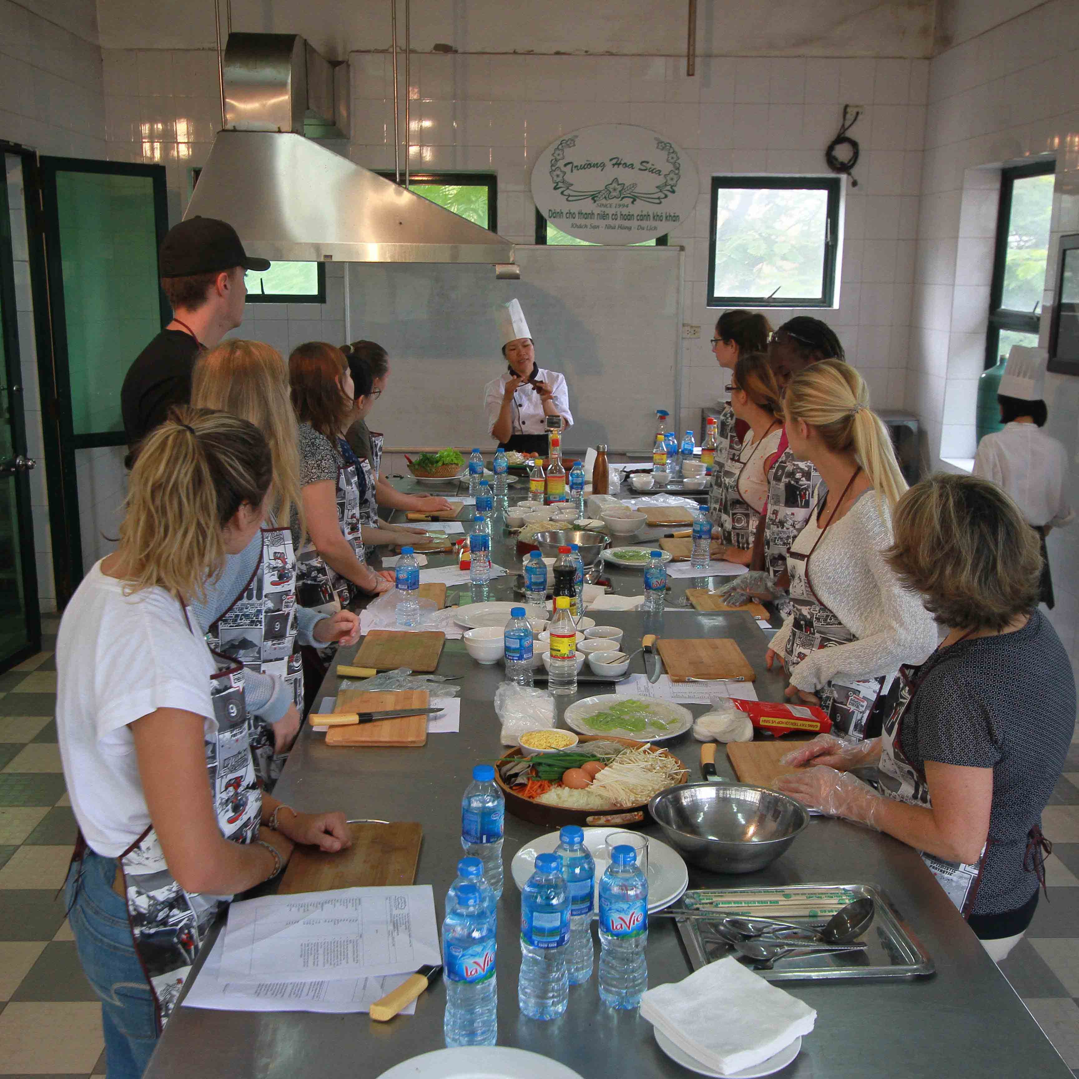 a group of people from Canada enjoying our cooking class