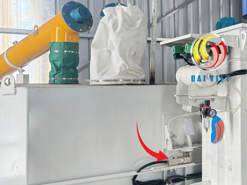 Máy cân định lượng trong dây chuyền vữa keo