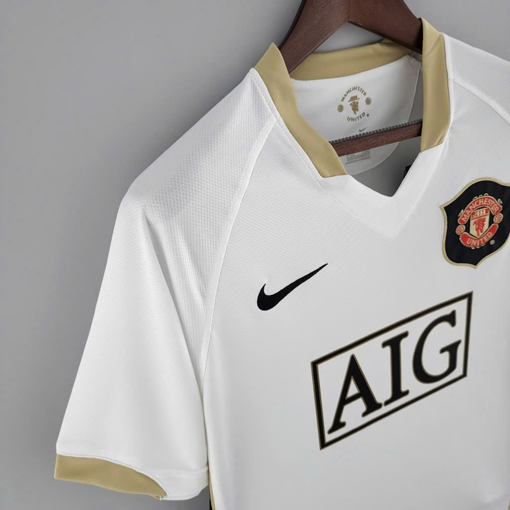 ÁO RETRO MU TRẮNG 2006