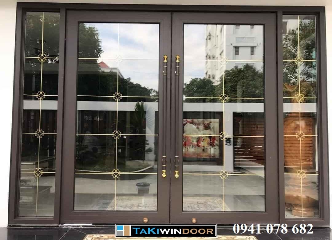 Thi công cửa thủy lực khung nhôm sử dụng kính hộp nan hoa đồng tại Cẩm Phả Quảng Ninh