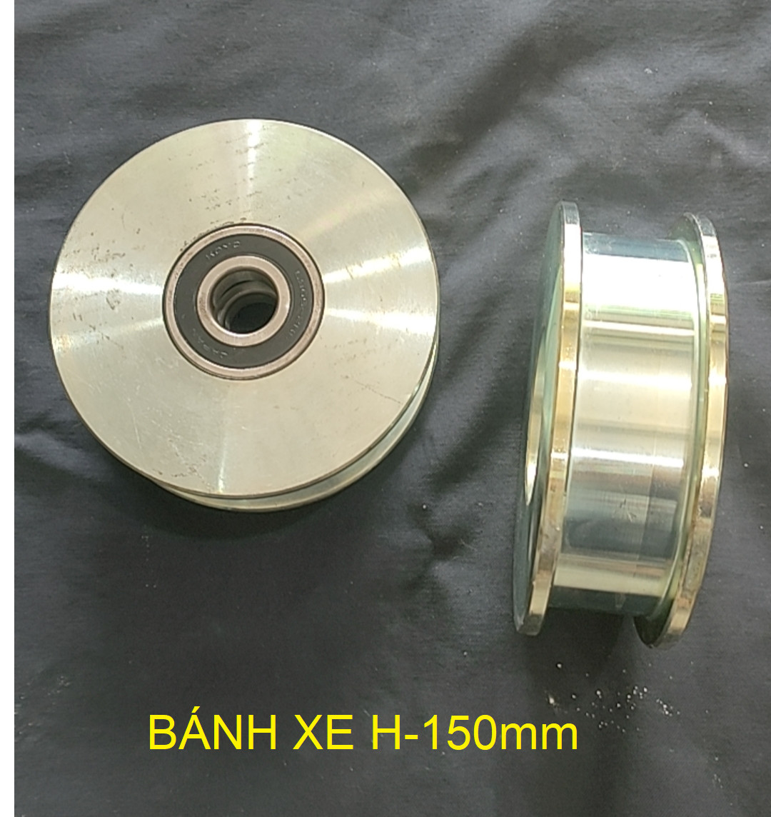 bánh xe H 150mm,  có bạc đạn  - lổ trục 25mm