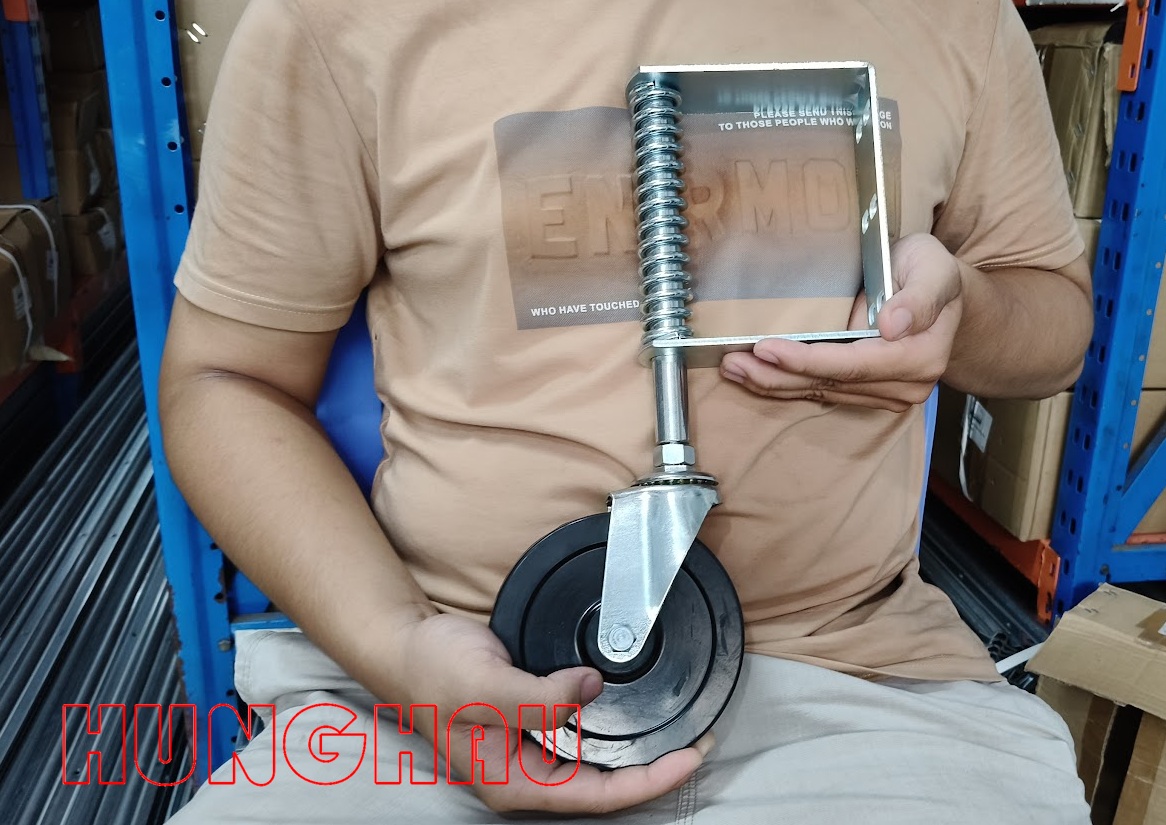 bánh xe lò xo đỡ đầu cánh cửa - chống xệ cánh cửa