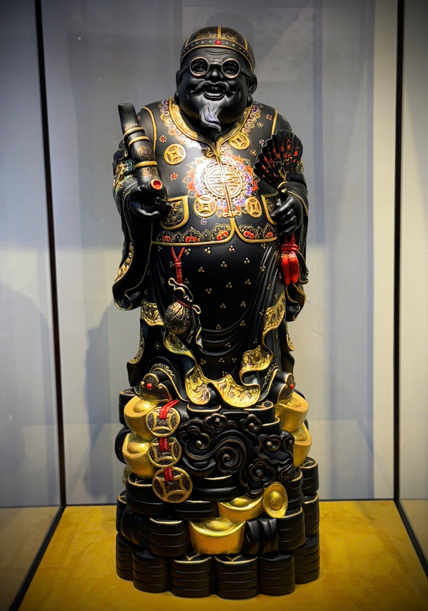 TƯỢNG THƯƠNG GIA GỖ MUN