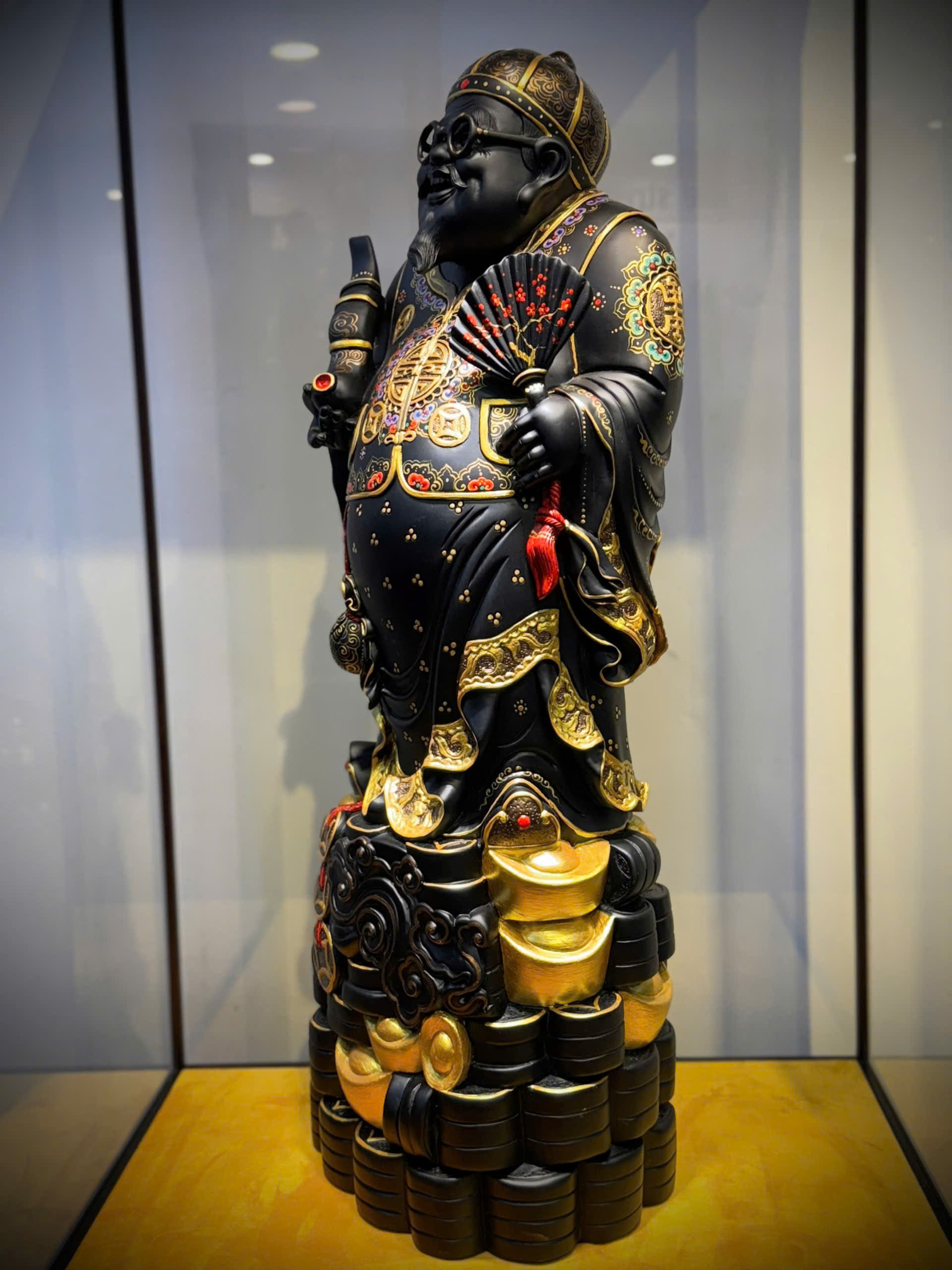 TƯỢNG THƯƠNG GIA GỖ MUN