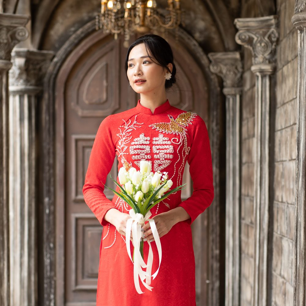 Màu đỏ biểu tượng cho điều gì? Những mẫu áo dài đỏ cô dâu tuyệt đẹp