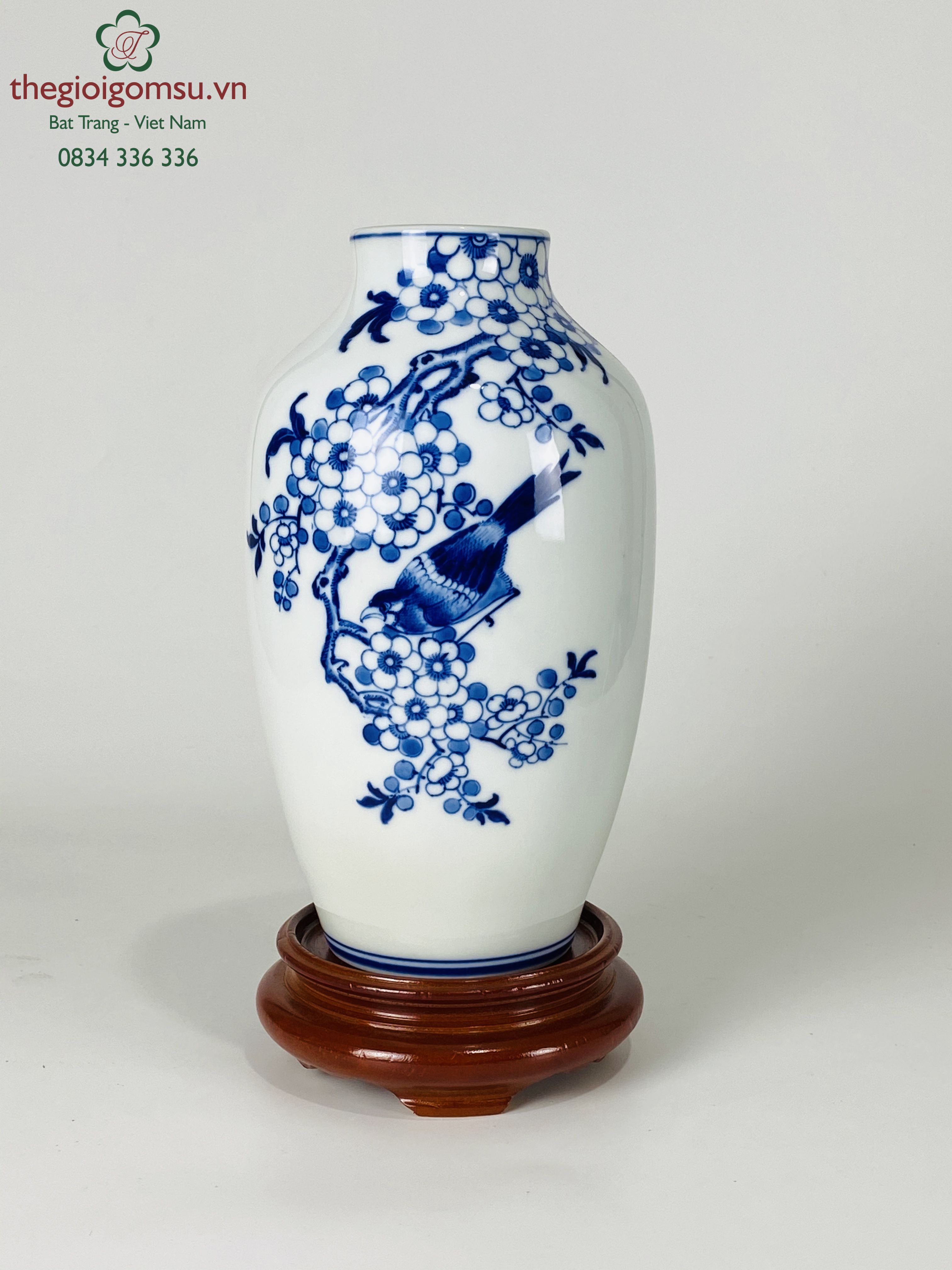 Bình hoa dáng vò "vẽ chim hoa đào men xanh" nền trắng tuyết