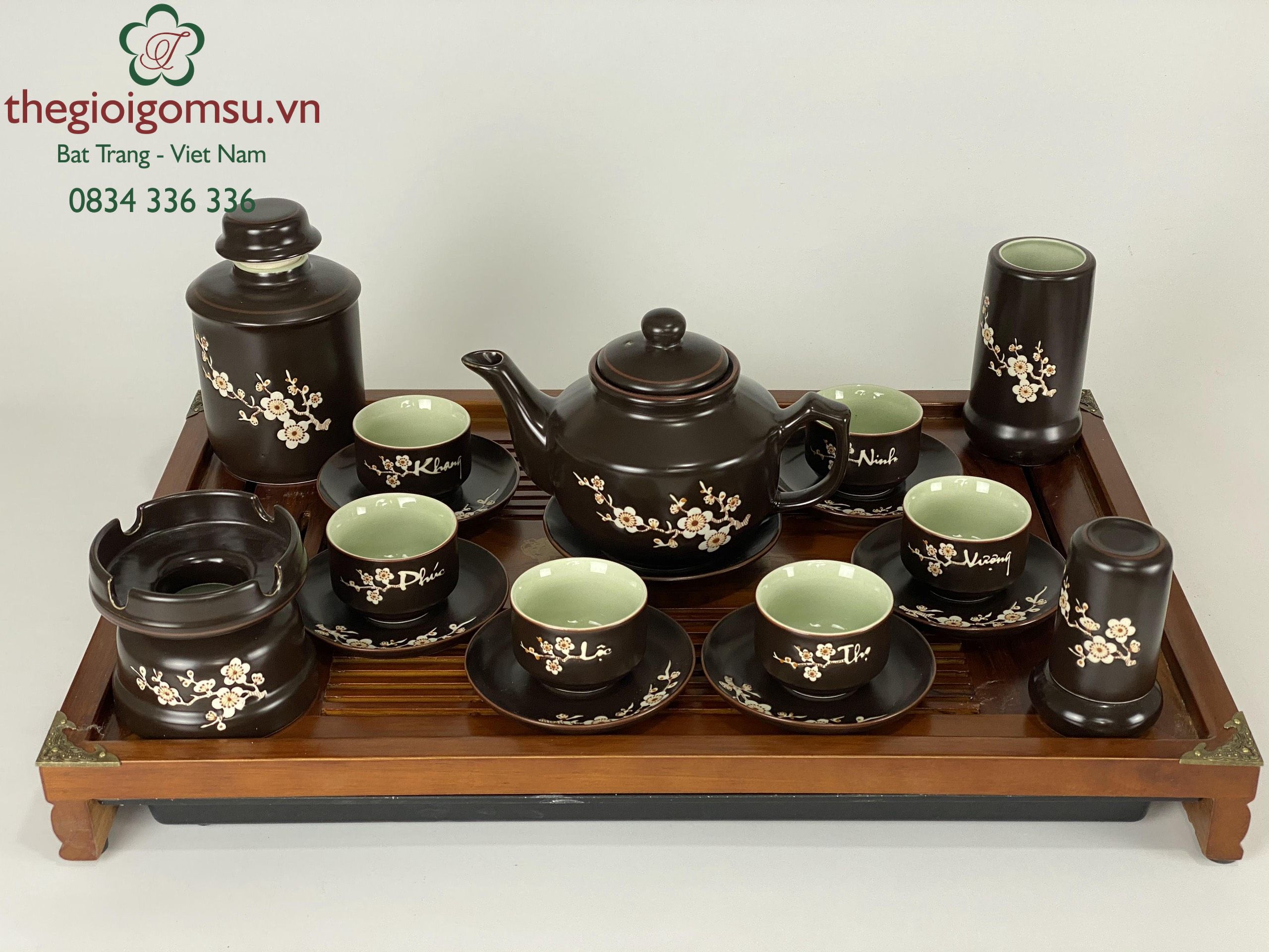 Ấm chén dáng tay trúc khắc hoa mai ngàn lời chúc