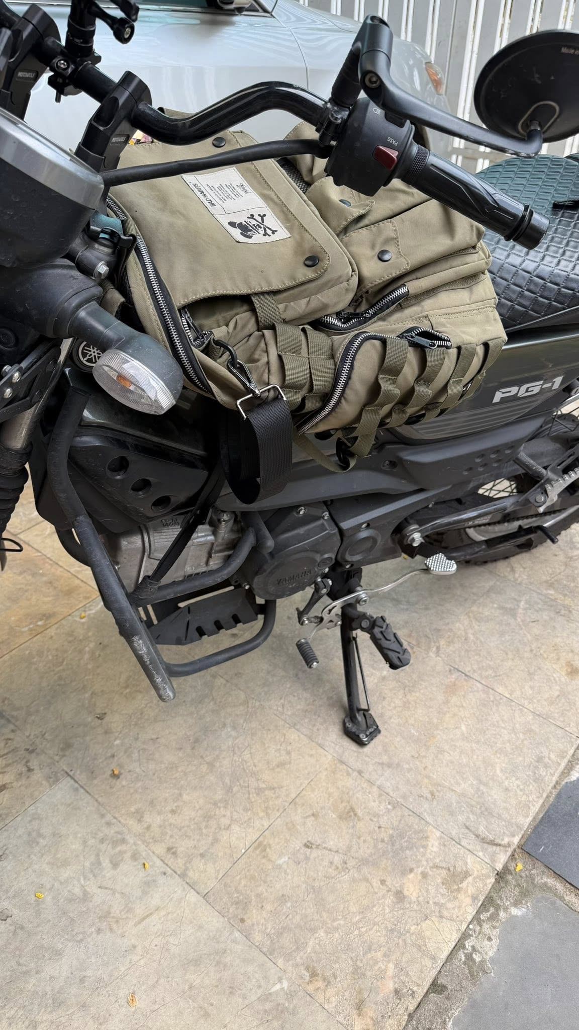 chong do xe may trang tri ket hop bao ve