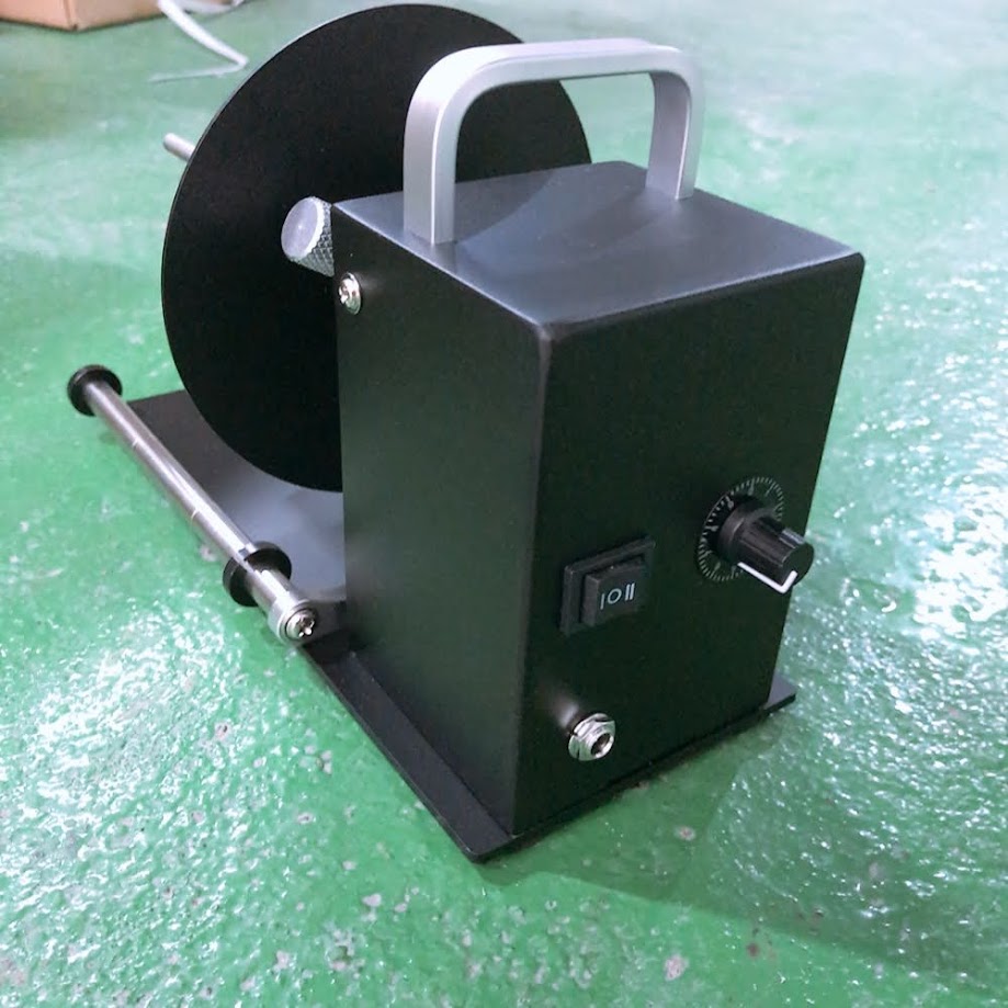 Máy cuộn tem nhãn tự động OM110 Hà Nội