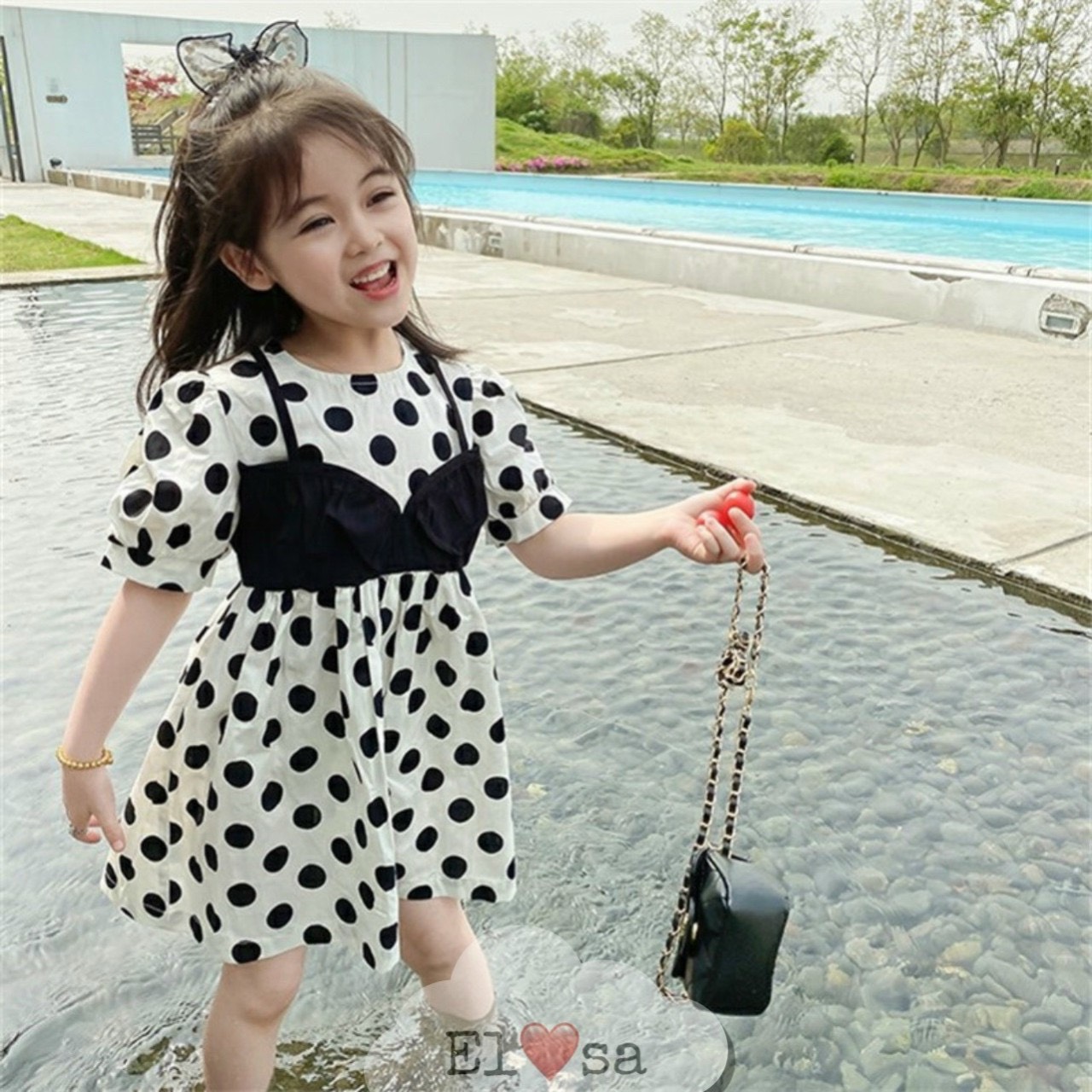 VÁY BÉ GÁI XOÈ CHẤM BI PHỐI DÂY ĐEN