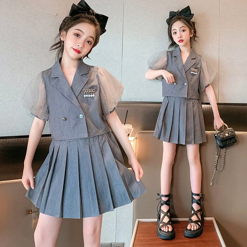 ❤️ set áo vest chân váy xếp ly về... - Chân ngắn boutique | Facebook