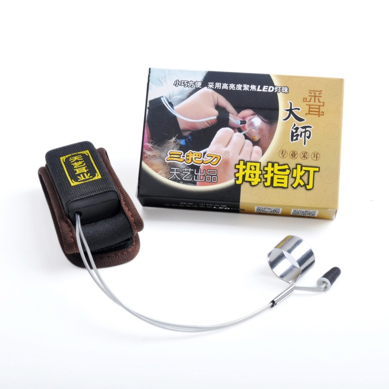 Đèn Ráy Tai Đeo Ngón Tay