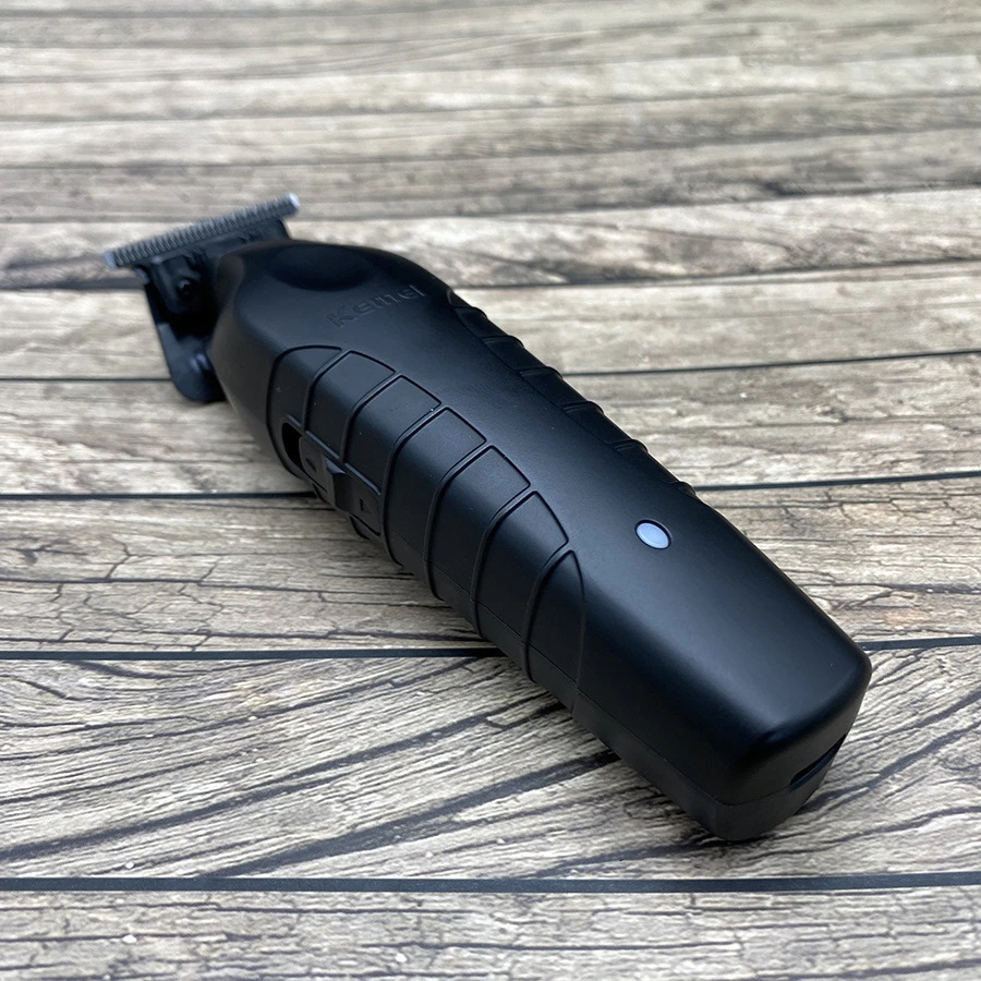 Tông cạo viền Kemei KM2299