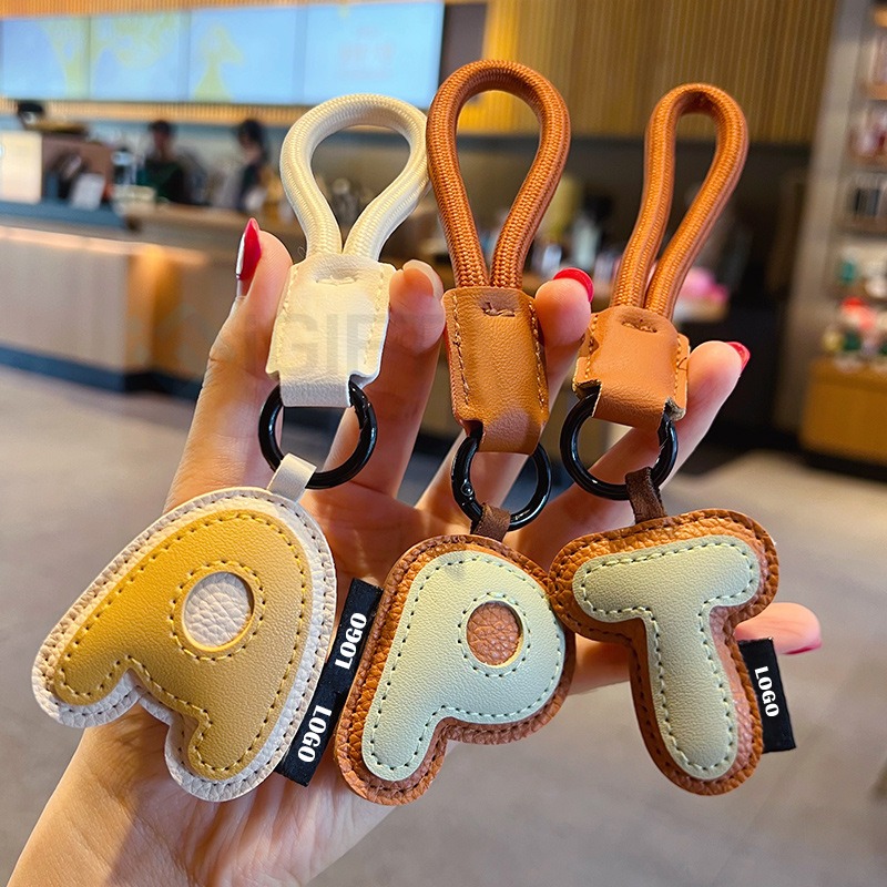 Móc khóa chữ cái tên brand - Tag logo in ấn theo yêu cầu